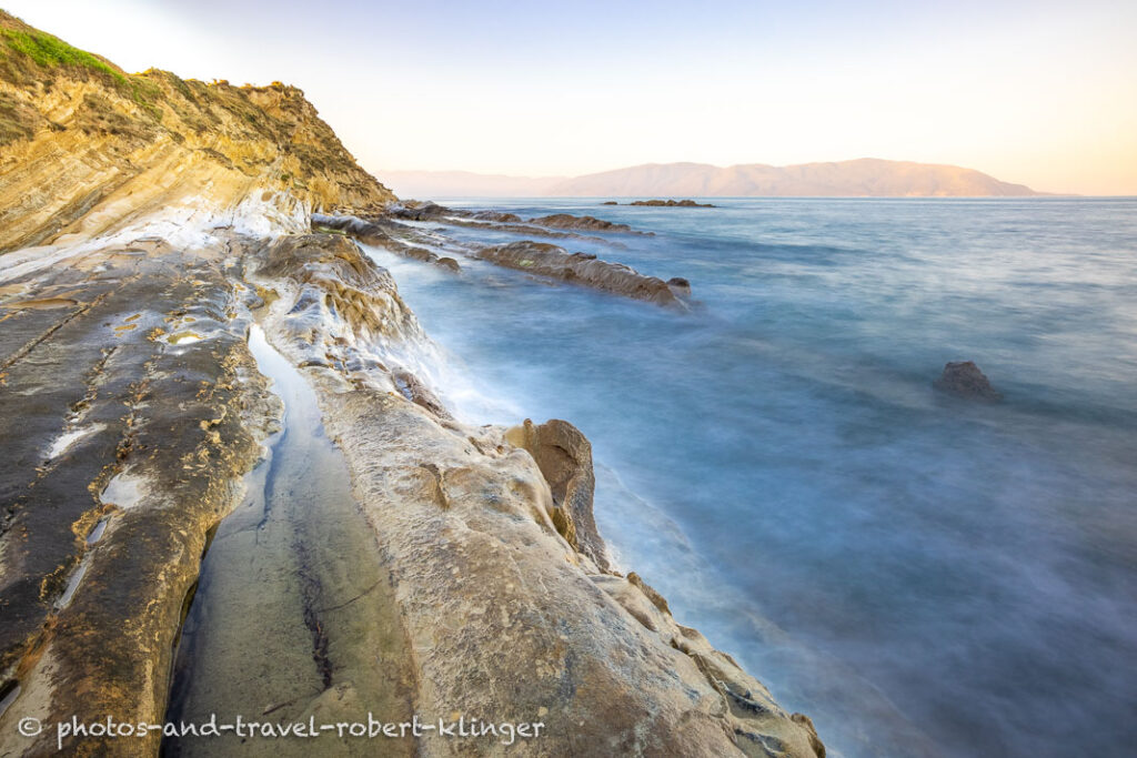 A long exposureshot of sandstone formations at the coast of Albania