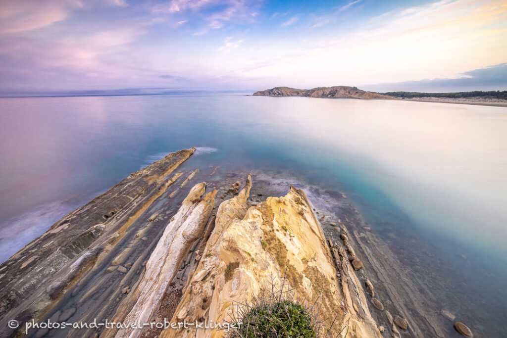 A long exposureshot of sandstone formations at the coast of Albania