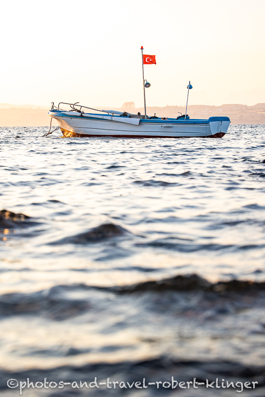 A fishing boat during sunrise in western Turkey
