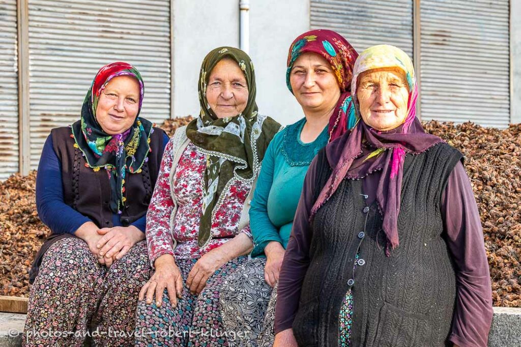 Four women after one day of hazelnut harvesting