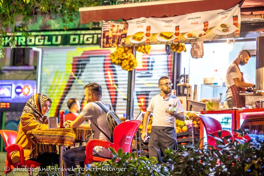 A young couple sitting in a Cafe in Istanbul