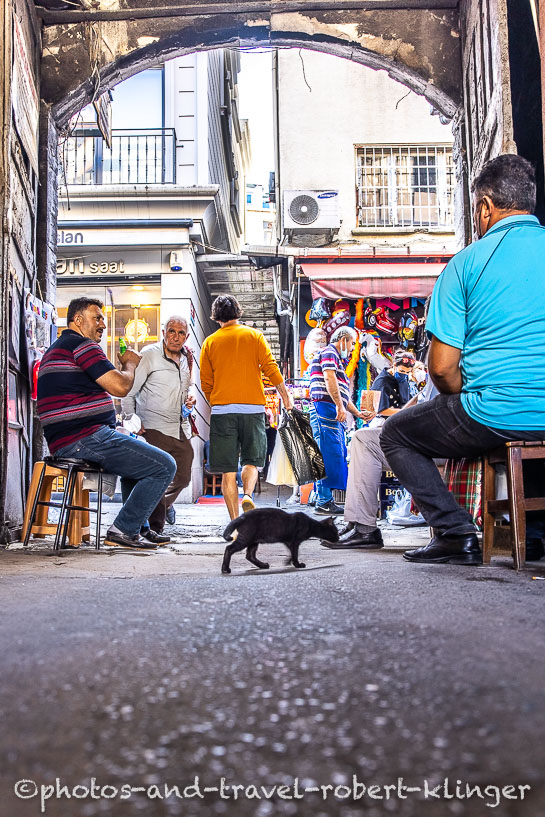 Older men sitting in an alley in Grand Bazar in Istanbul