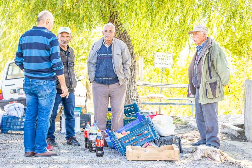 A few men selling fruits along the road in Cappadocia