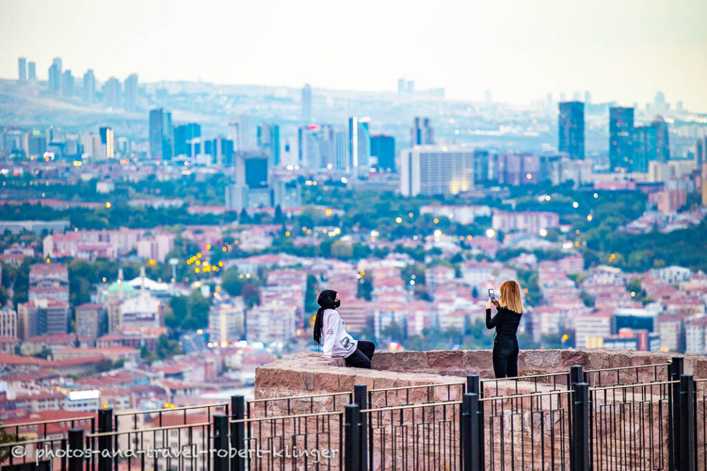 Two young women taking photos on the Citadel in Ankara