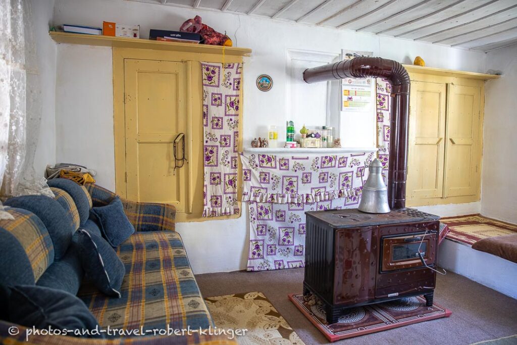 A wood stove in a living room in Turkey