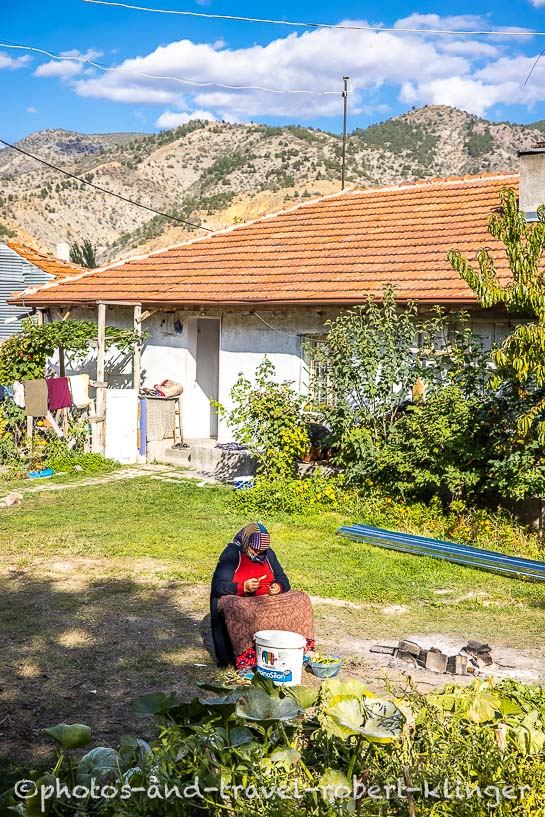 A woman in her garden in the turkish village Korgun