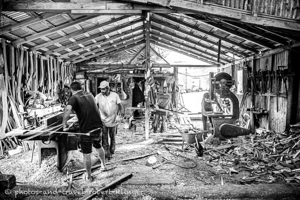 Black and white photo of a boat building workshop in Turkey
