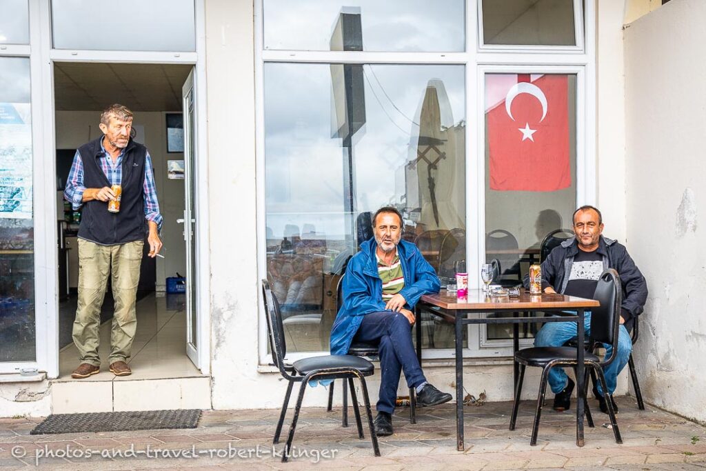 Portrait of 3 men in a tearoom in Tekkeönü at the Black Sea in Turkey