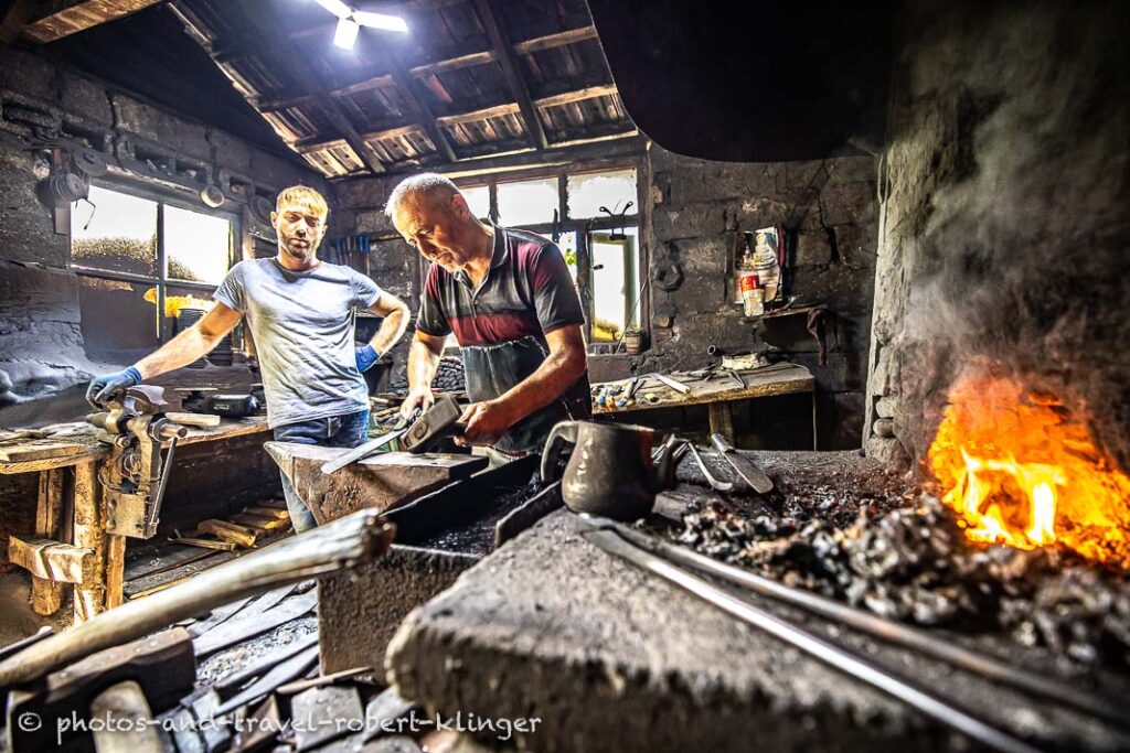 Two forgers at work in their workshop in Turkey at the Coast of the Black Sea