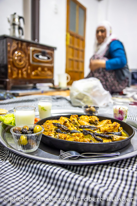 A turkish meal, chicken, olives, vegetables and Ayram for dinner