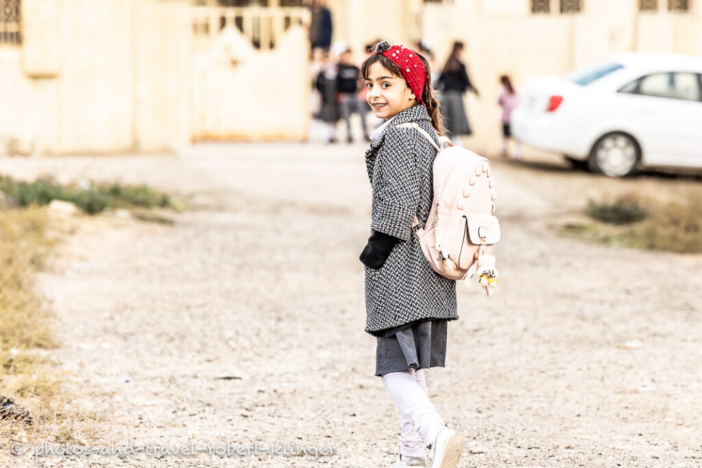 A iraqi girl on the way to school