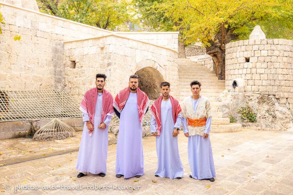 Four Yezidi men in Lalish, Iraq