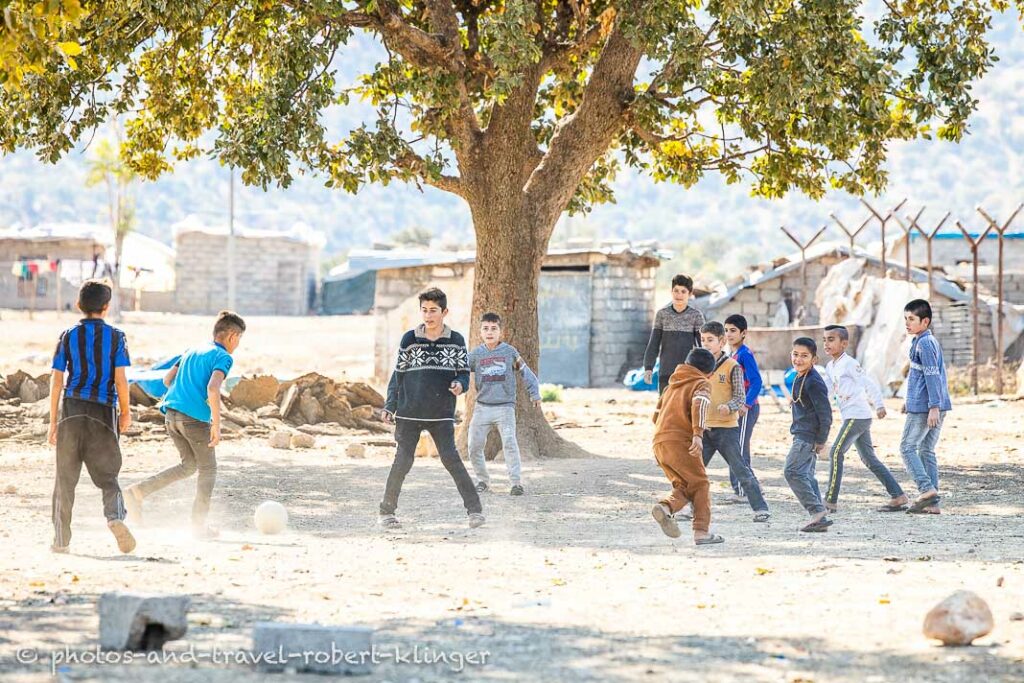 Iraqi boys playing soccer in Kurdistane