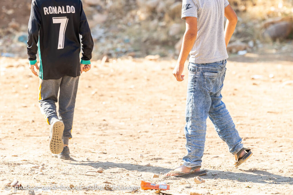 Two boys playing soccer in Kurdistan