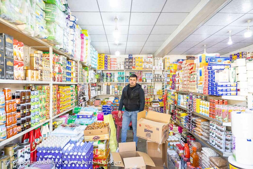 A Iraqi man in his store in Kurdistane