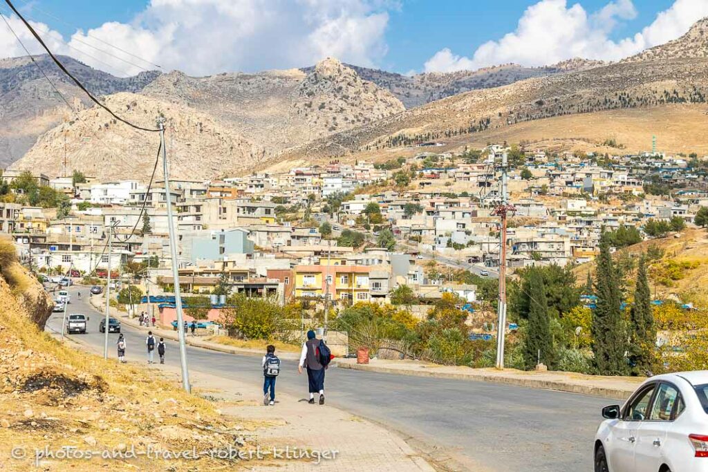 Children walking home from school in the town of Akre in Kurdistan