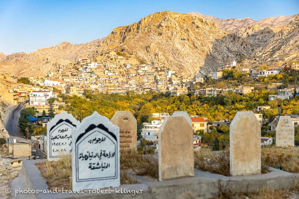 The town of Akre in the morning, a little cemetery in the foreground
