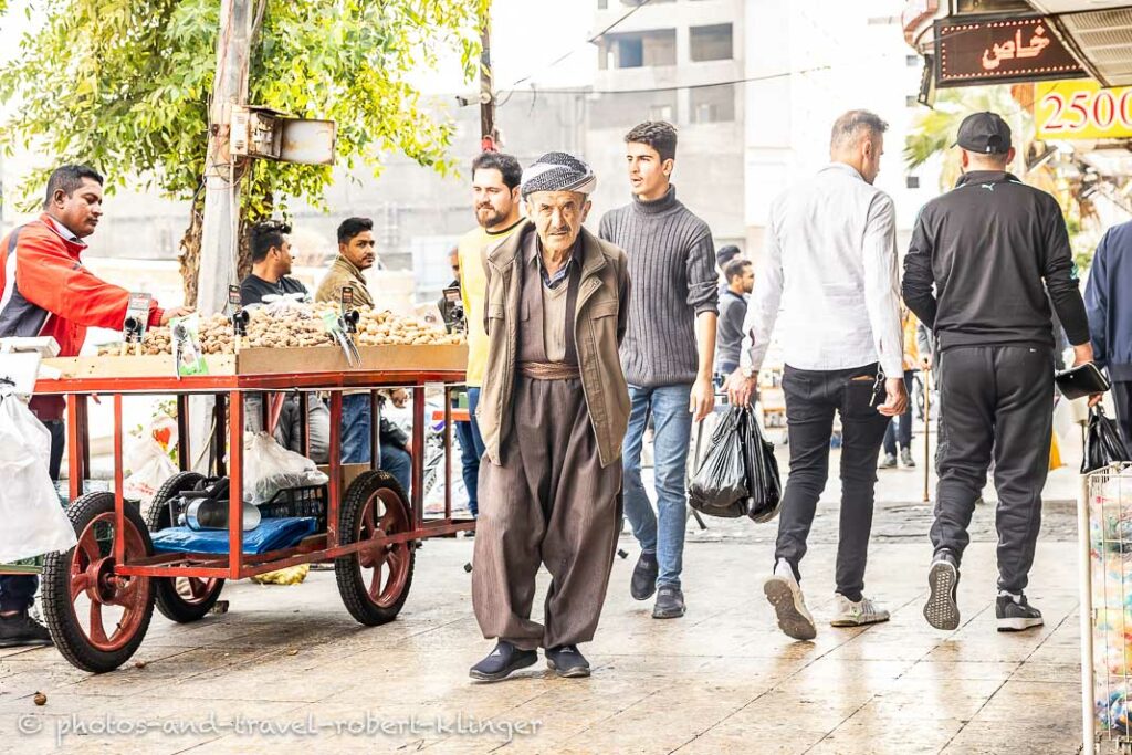 A old man is walking in Erbil, Kurdistan