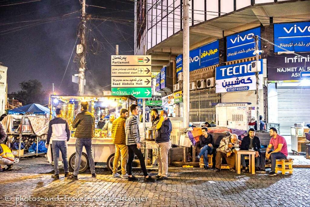 A few men at a street restaurant in Erbil