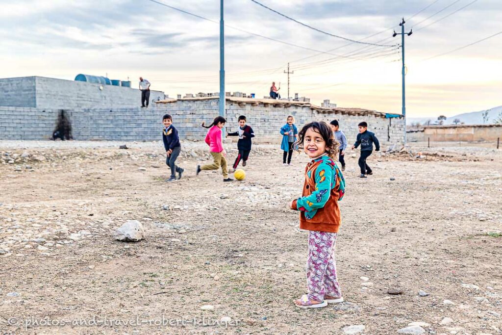 Children are playing soccer in a village in Kurdistan, Iraq