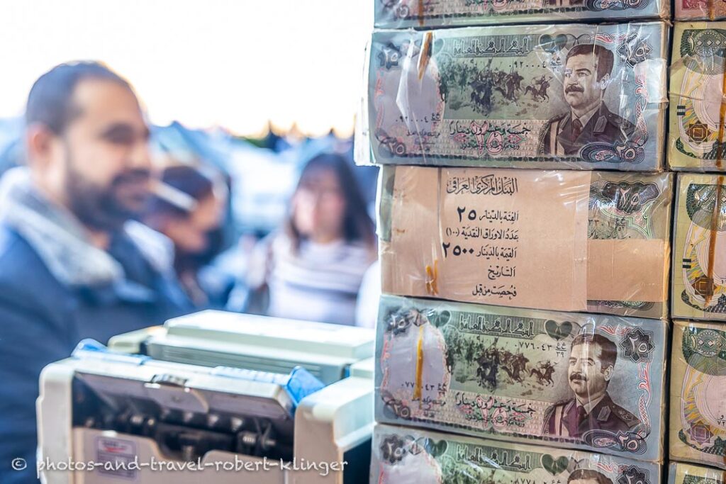 Old notes with the former Iraqi president Saddam Hussein