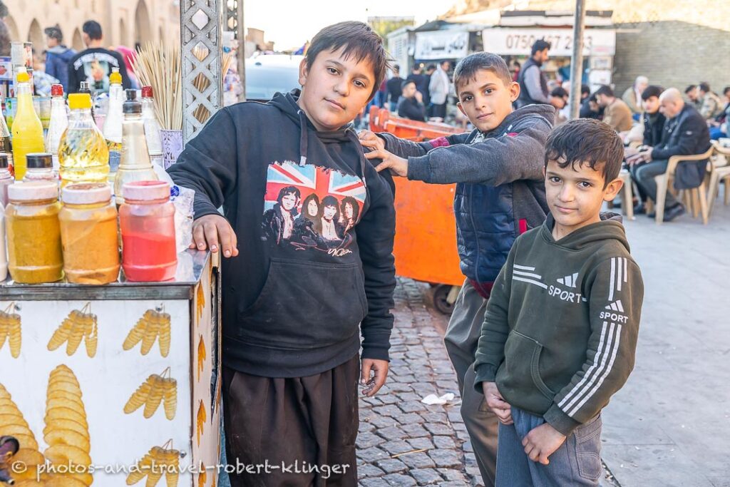 Three boys at a street restaurant in Erbil, Kurdistan