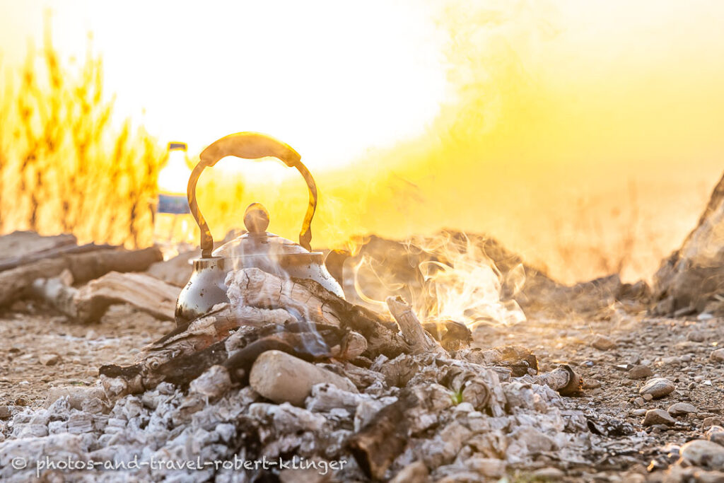 A teapot in a campfire in Kurdistane