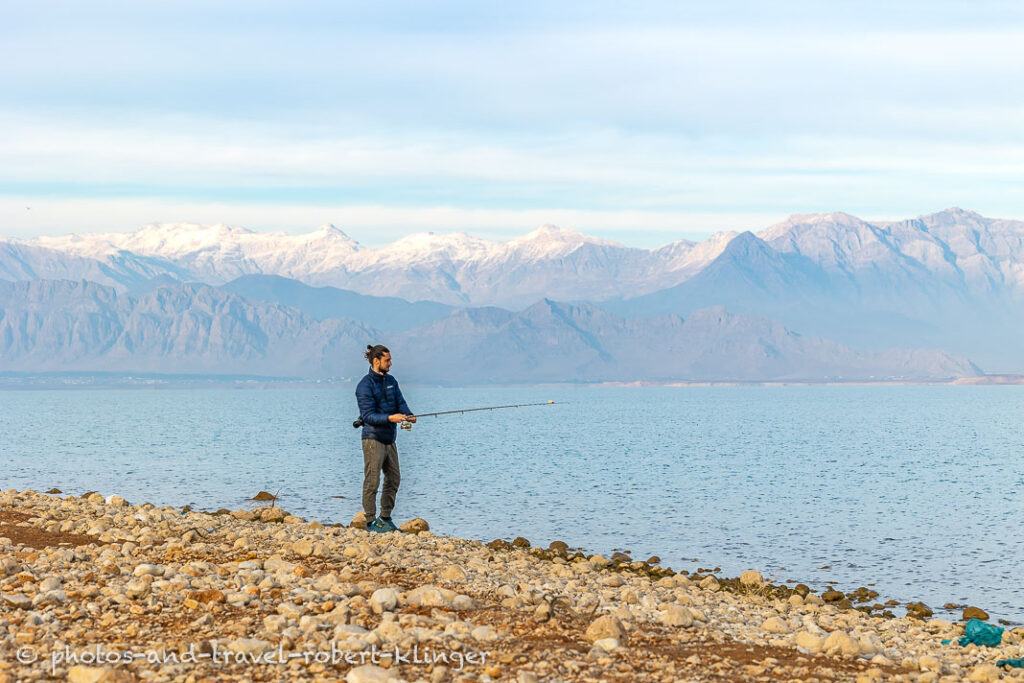 A fisherman at Lake Dukan, Kurdistane, Iraq