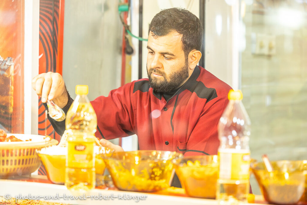 A man preparing street food in Kurdistane