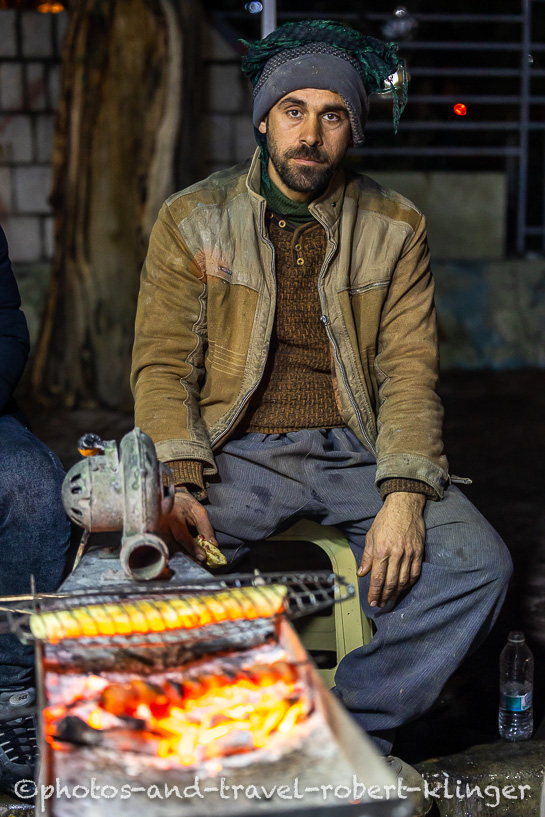 A kurdish man in a street restaurant in Dukan, Kurdistan
