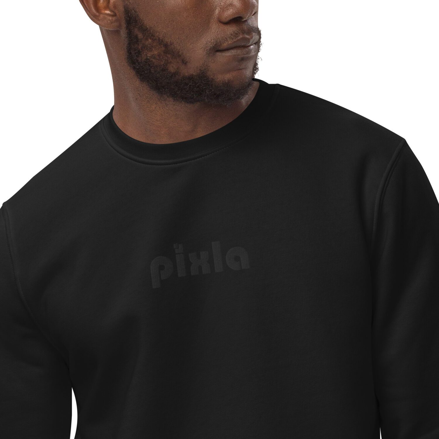 A classic slim-fit black-on-black premium sweatshirt with crispy white embroidery on the front chest. Made from organic ring-spun combed cotton and recycled polyester in medium-weight with a soft feel. Super soft fleece inside making it perfect for keeping warm.