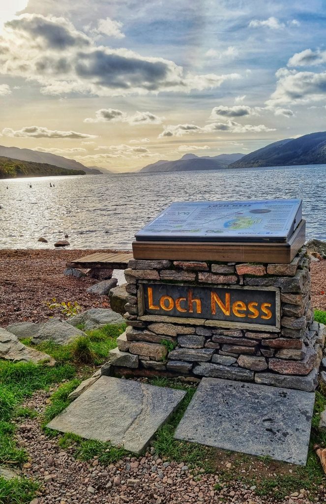 View of the Loch Ness sign overlooking the loch. Whenever you check out guides on things to do when visiting Scotland, Loch Ness will always be one of the first things to come up.