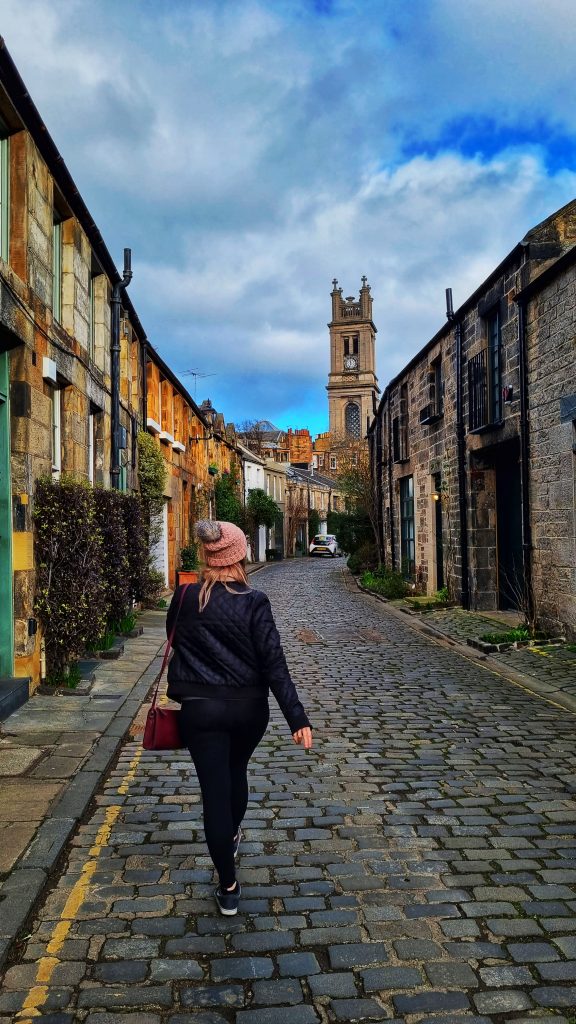 Amy walking down the beautiful Circus Lane located in Edinburgh, Scotland. This is one of the more unique things to do when you are visiting which is why we wanted to include it in the guide because it is such an Instagrammable spot.