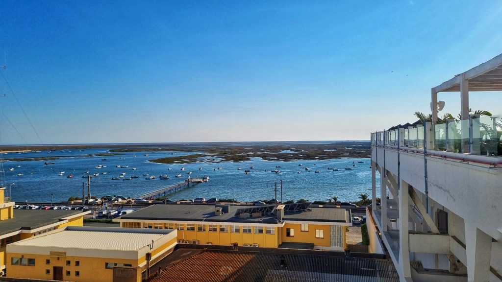 The views from Eva's Rooftop which overlooks the Ria Formosa lagoon. You won't be stuck on what to do in Faro because you could spend hours here drinking cocktails and enjoying the DJ set and rooftop swimming pool.