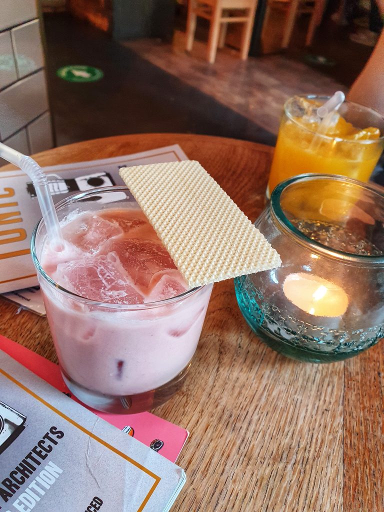 If you want to know how to meet people when you're solo travelling then bar and pub crawls are the best way to do this. This photo shows 2 drinks at a cocktail bar called Tonic in Edinburgh.
