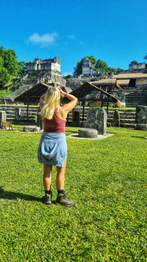 When you're travelling solo it can be hard to know how to meet people. Asking people to take a photo for you is one of the best ways to start a conversation. This photo is of Amy at some Mayan ruins in Mexico.