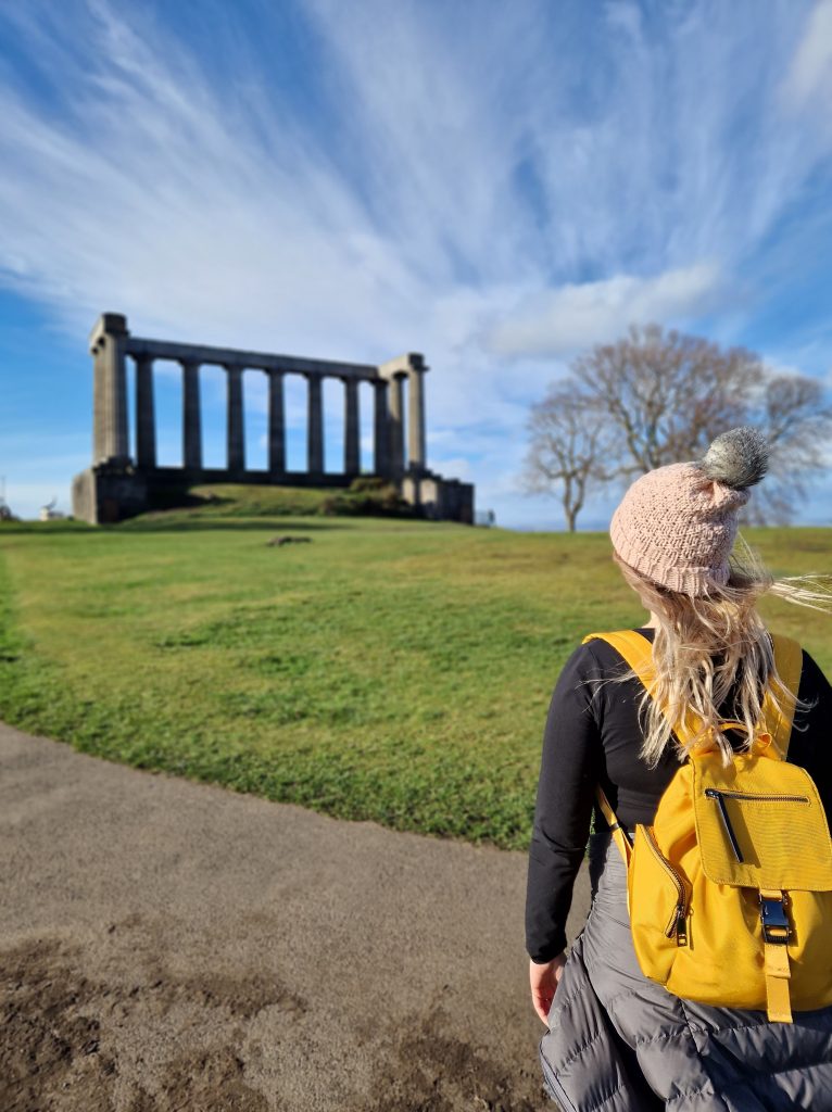 Wandering around Calton Hill is absolutely priceless. This shows an image of Amy standing in front of the National Monument.