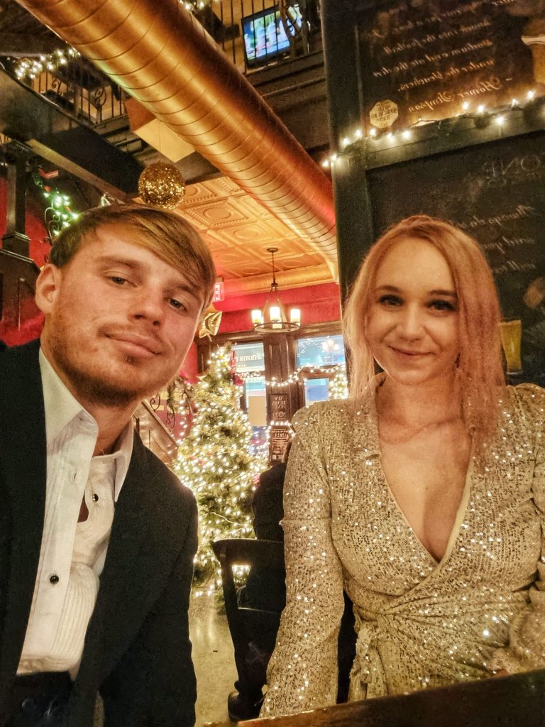 Amy & Liam enjoying drinks before boarding the party boat.