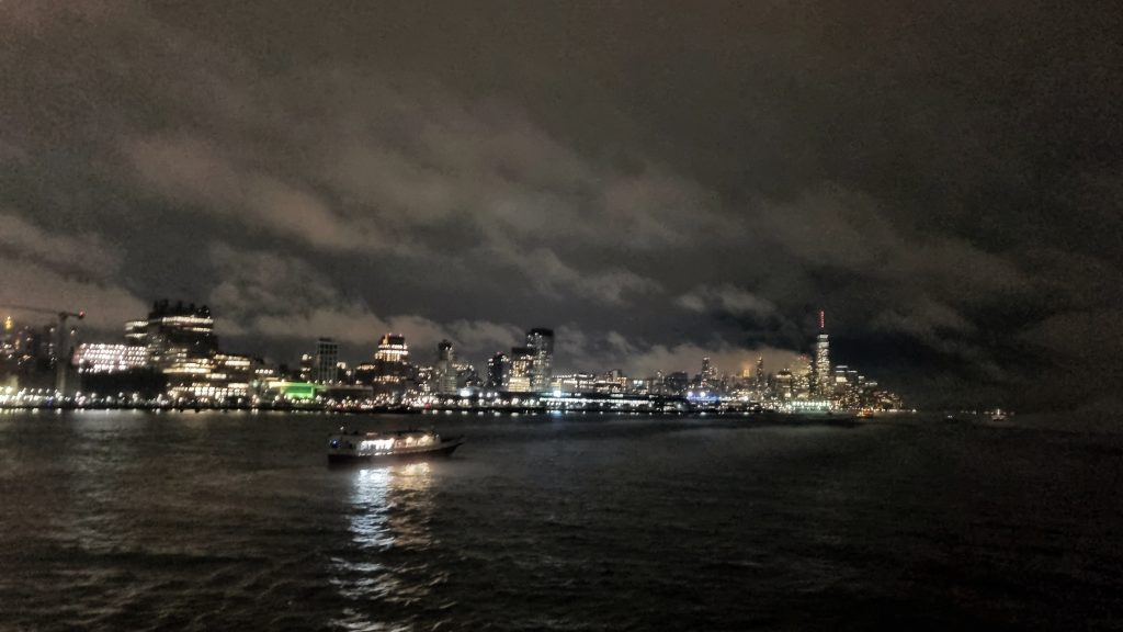 When we joined the NYE cruise in New York, it was quite a foggy night but we still managed to get a photo of the lights from the city across the river.
