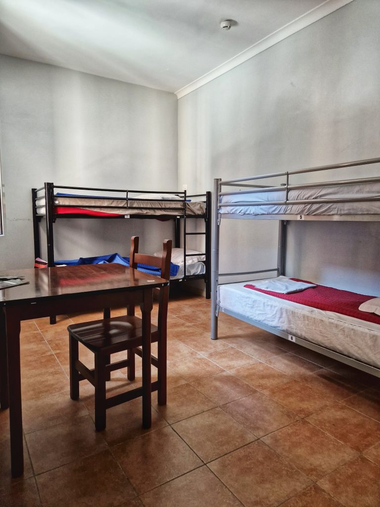 Traveling in a hostel is a lot safer than you may think. This image shows one of the dorm rooms in Alessandro Palace in Rome.