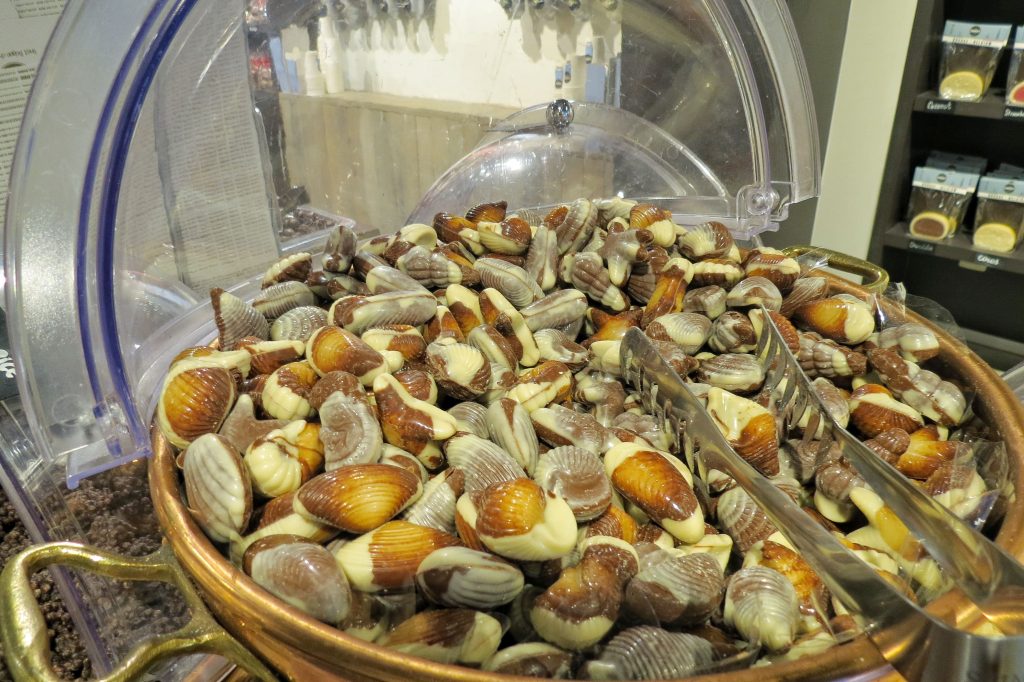 Belgium is famous for its incredible chocolate. This image shows a huge bowl of chocolate seashells.