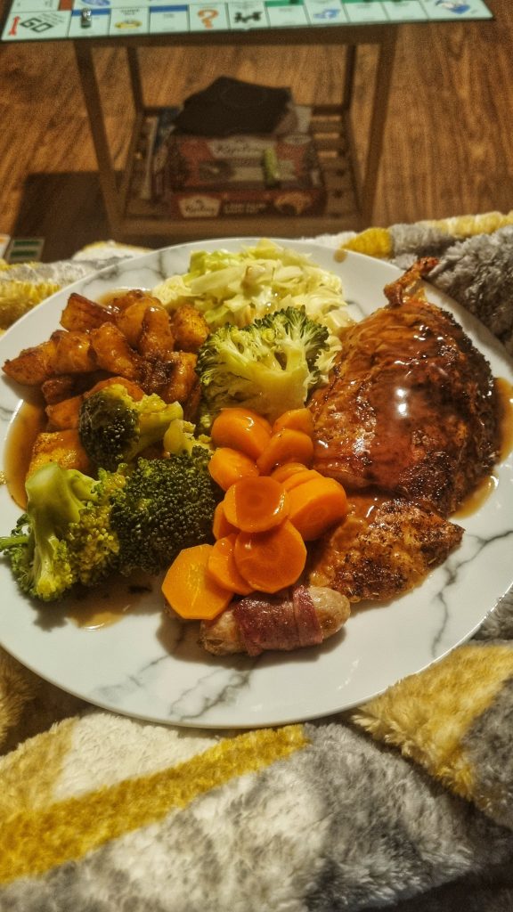 We create a fake Christmas Day every year so that we can spend some quality time together before the craziness of Christmas itself. This image shows our own roast dinner that we made on one of our fake Christmas days.