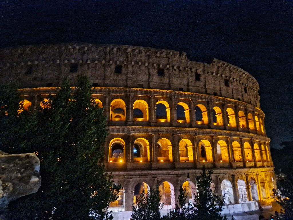 View of the colosseum in Rome at night.