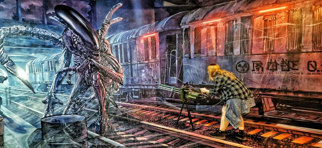 Whilst in Barcelona, we visiting the illsuions museum and this image shows Amy shooting the alien in a subway from the movie Alien.