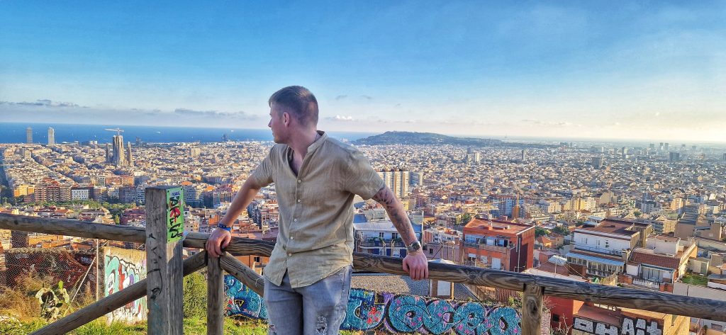 Liam with the viewpoint from Carmen Bunkers where you can see across Barcelona including La Sagrada Familia.