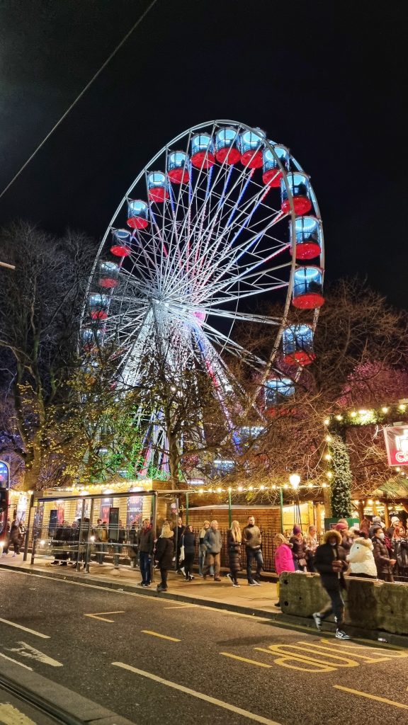Visit your local town and watch the Christmas lights turn on together. We love to visit Edinburgh's Christmas lights especially seeing the ferris wheel all lit up at night.