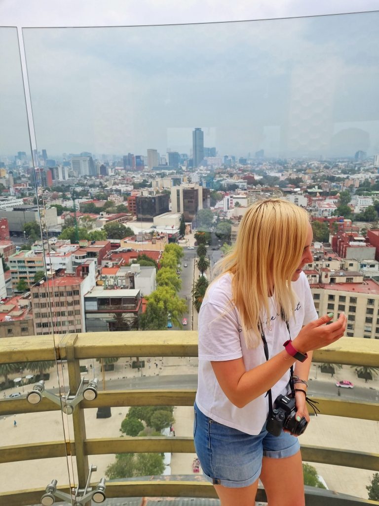 Amy laughing whilst her photo is being taken in Mexico City.