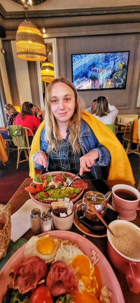 Amy enjoying some breakfast in Paris.