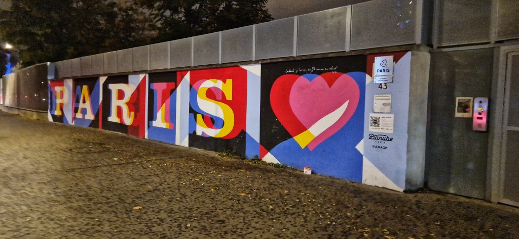 Sign with Paris written on it with a love heart.