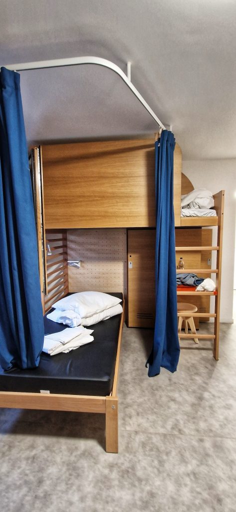 Hostels are a great way to meet new people and explore together. We stayed at UCPA Sport Station Paris hostel.